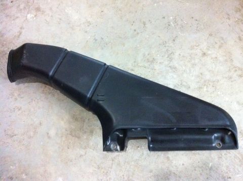 2007 Subaru Impreza - Black plastic air intake duct shown on a concrete surface.