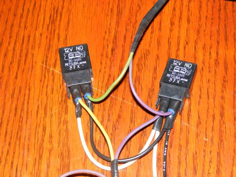 Two Mitsuba RC-2225 12V NO automotive relays with wiring harnesses attached