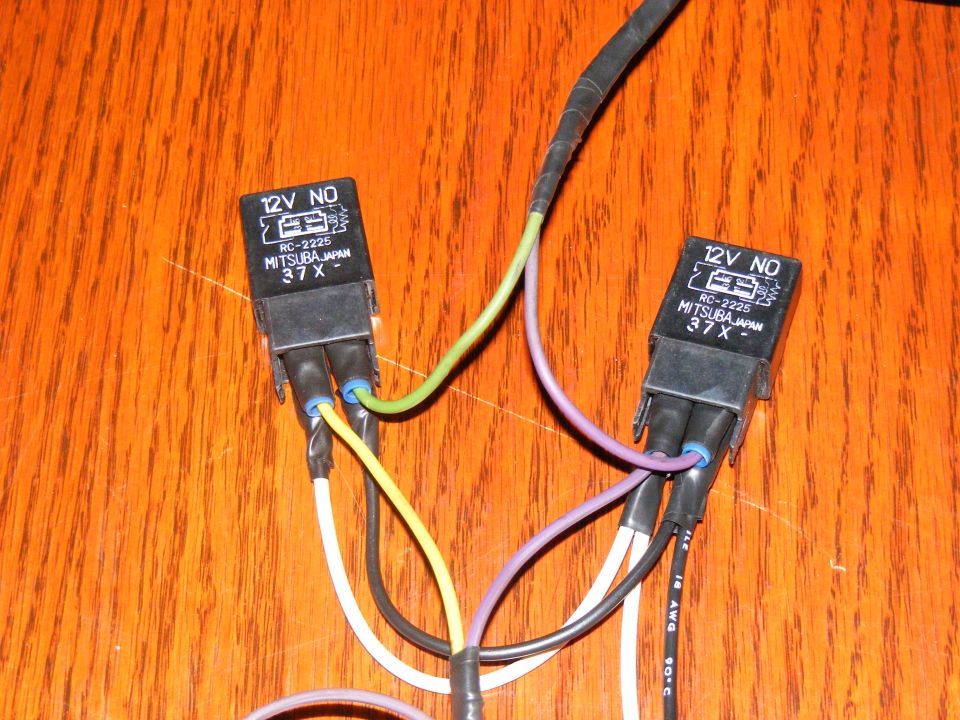 Two Mitsuba RC-2225 12V NO automotive relays with wiring harnesses attached