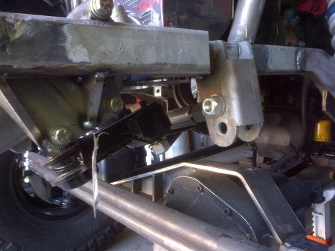 1985 Jeep CJ7 - Custom suspension components are visible, along with the Supermotors website logo in the lower right corner.