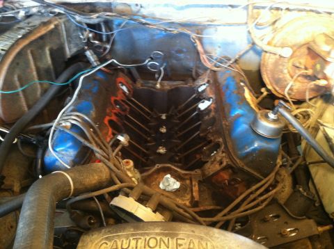 1979 Ford Bronco - Close-up view of a V8 engine bay, showing the internal components and wiring.