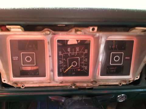 1978 Ford Bronco - Close-up of the instrument cluster, showing various gauges and warning lights.
