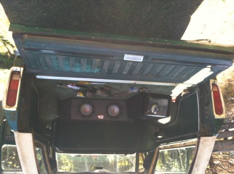 1978 Ford Bronco - The rear cargo area of the vehicle is fitted with aftermarket subwoofers and audio components.