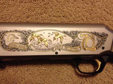 1990 Ford Bronco - Engraved shotgun receiver shows "Special Edition" and "Ducks Unlimited 70th Anniversary" details.
