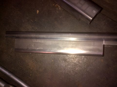 1985 Jeep CJ7 - Close-up of a fabricated metal component, possibly for automotive use.