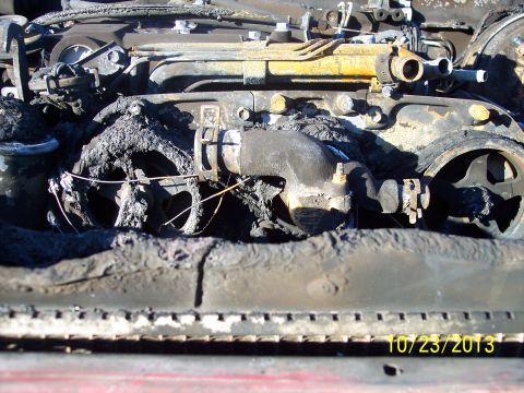 1991 Toyota Pickup/SR5 - Fire damage to engine compartment, showing extensive charring and melted parts. Date stamp visible.