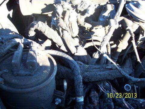 1991 Toyota Pickup/SR5 - The engine bay shows significant damage to hoses and wiring, with a date stamp of 10/23/2013 visible.