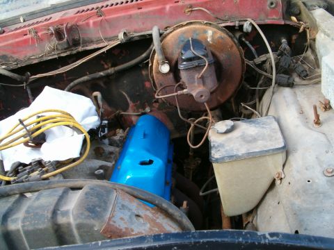 1979 Ford Bronco - Valve cover and hood perches back on.