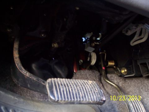 1991 Toyota Pickup/SR5 - Interior view of the driver's side footwell, showing the pedals and surrounding components.