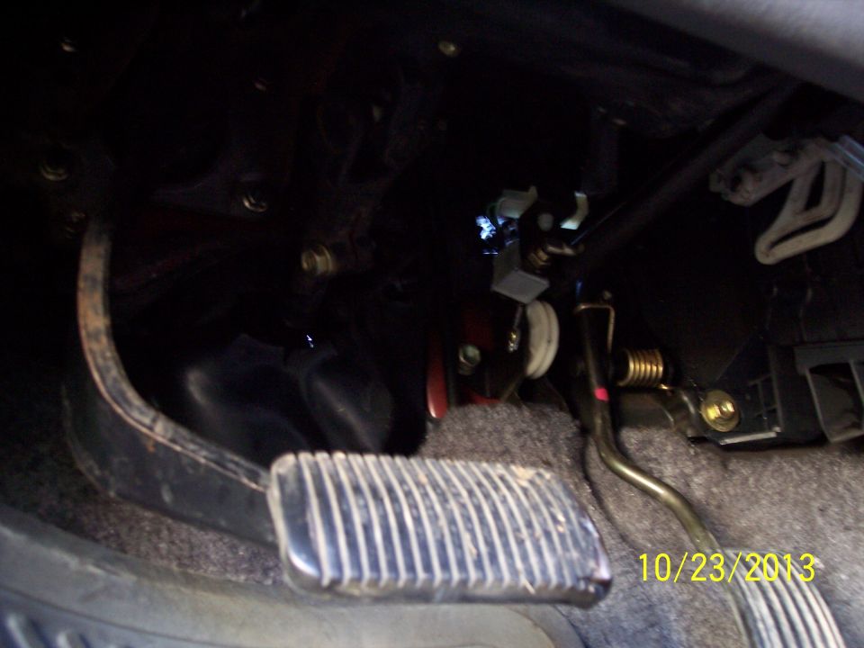 close-up of brake and clutch pedals in a vehicle