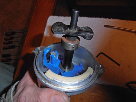 1990 Ford Bronco - A close-up view of a vehicle's distributor component, showing internal parts.