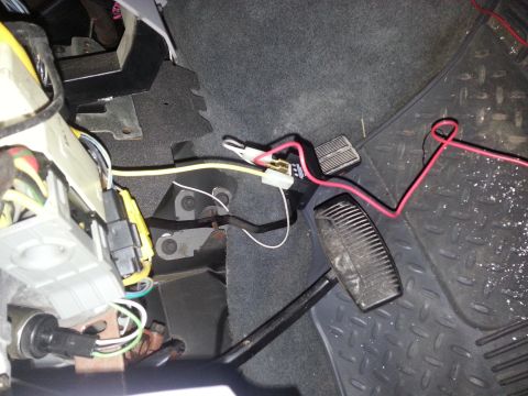 1996 Ford Bronco - Close-up view of vehicle wiring and pedals, likely related to aftermarket installations.