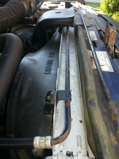 1994 Ford Bronco - Photograph of an engine bay and fan shroud, not a technical document.