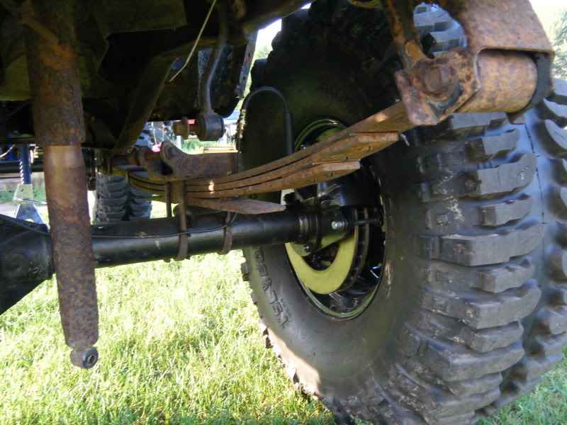 Rear suspension and large tire of an off-road vehicle.