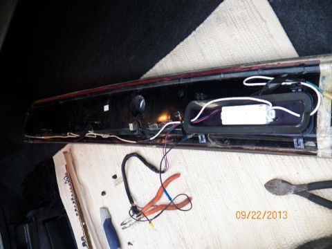 1998 Lincoln Mark VIII - Tail light assembly with wiring and ballast, tools on the surface. Date stamp shows 09/22/2013.