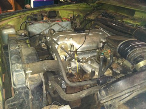 1975 Ford Courier - Close-up view of an engine bay, showing various components and wiring.