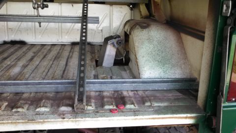 1967 Ford F-250 - Interior view of a truck bed, showing a jack and metal bracing installed.