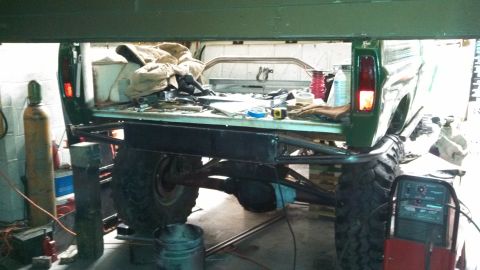1967 Ford F-250 - Custom metal fabrication is underway on the bed of a 1967 Ford F-250 pickup truck.