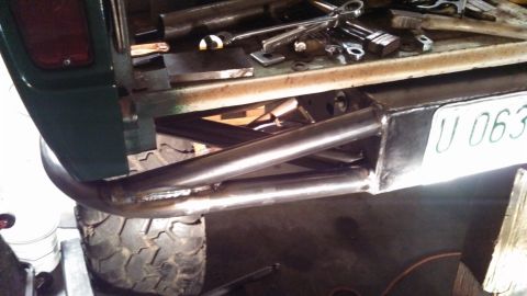 1967 Ford F-250 - Custom bumper fabrication in progress, with tools visible on the workbench.