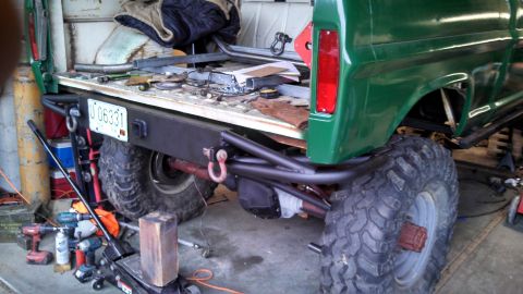 1967 Ford F-250 - Rear view of a modified 1967 Ford F-250 pickup truck undergoing custom work.