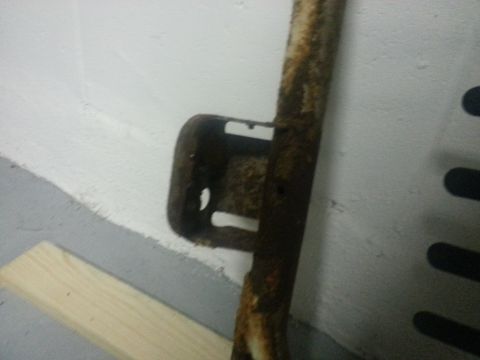 1994 Ford Bronco - This photo shows a rusty metal bracket, not a 1994 Ford Bronco seat.