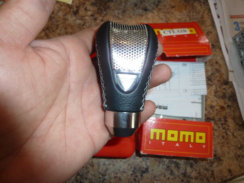 Momo Italy gear shift knob with perforated metal and leather