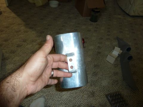 2007 Subaru Impreza - An aluminum intake tube is held by a hand, with other automotive parts scattered on the carpeted carpeted carpeted carpeted carpeted carpet…