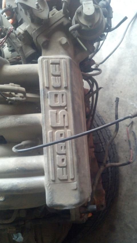 1988 Ford Bronco - Close-up of a Ford 5.8L engine valve cover, showing the displacement in liters.