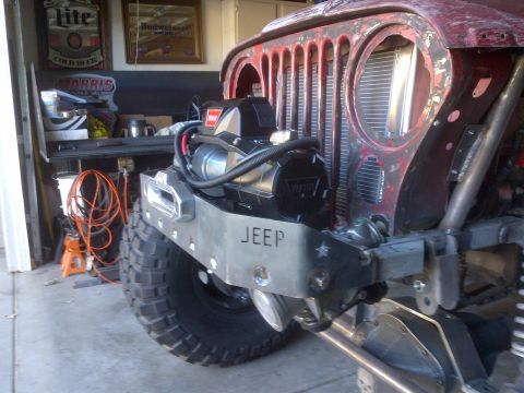 1985 Jeep CJ7 - Front view of a 1985 Jeep CJ7 showing the bumper and winch installation.