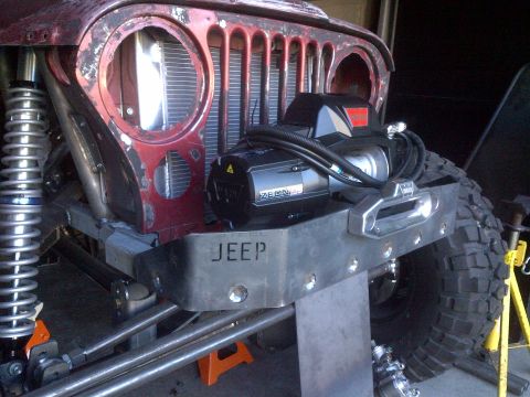 1985 Jeep CJ7 - Customized Jeep front end shows off its winch and heavy-duty bumper.