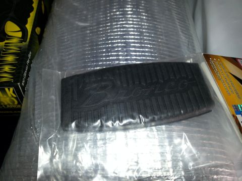 1994 Ford Bronco - This is a replacement pedal pad for a Ford Bronco, shown in its original packaging.