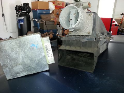 1994 Ford Bronco - Ford ECU and mass air flow sensor housing shown together.