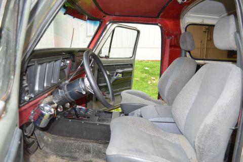 1989 Ford Bronco - Interior view of a 1989 Ford Bronco, showing the dashboard, steering wheel, and front seats.