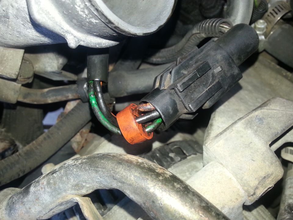 Throttle body sensor connector with exposed wires and orange seal