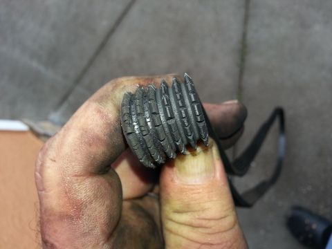 1994 Ford Bronco - Serpentine belt shows significant wear and cracking on its ribs.