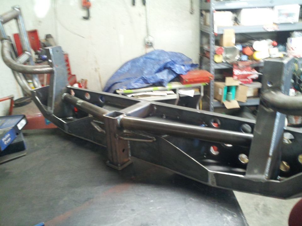 custom steel bumper assembly on a workbench