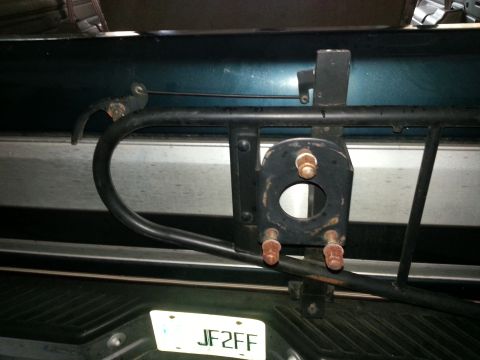 1994 Ford Bronco - Rear view of a 1994 Ford Bronco showing the spare tire mount and license plate.