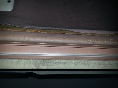 1994 Ford Bronco - Close-up of the interior trim on the tailgate of a 1994 Ford Bronco.
