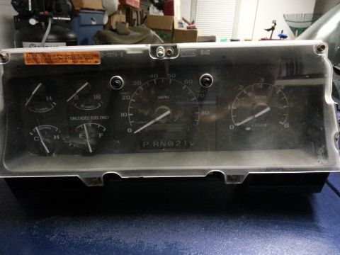 1994 Ford Bronco - This is a vehicle's instrument cluster, multiple gauges and indicators for various functions.