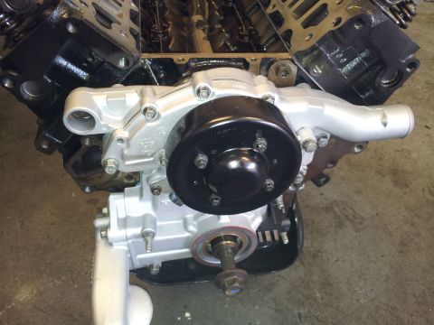 2001 Chevrolet Impala - Close-up view of an engine's water pump and block assembly.