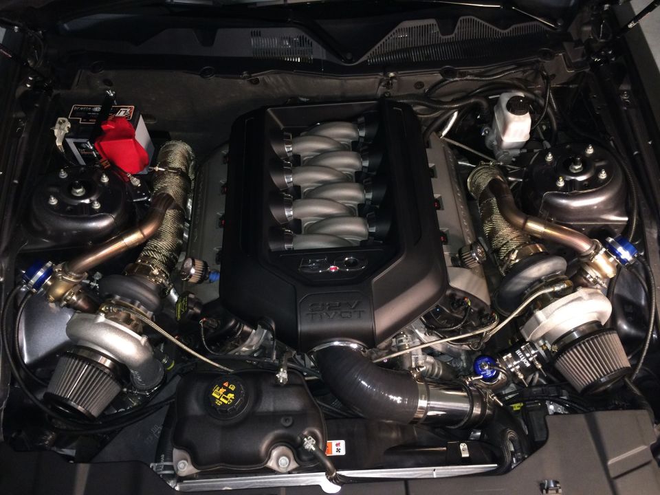 2013 Ford Mustang twin-turbocharged V8 engine with custom exhaust and intake components