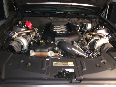 2013 Ford Mustang - Custom twin-turbocharged 5.0 Coyote V8 engine with aftermarket intercooler and intake system.