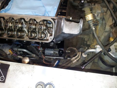 2001 Chevrolet Impala - Close-up view of an engine's internal components, with the valve cover removed for maintenance or repair.