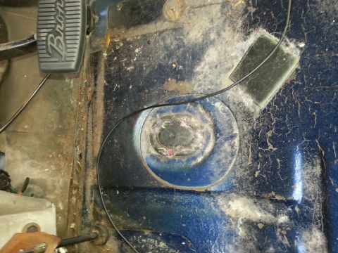 1994 Ford Bronco - Close-up of the driver's side floor area in a 1994 Ford Bronco, showing the brake pedal.