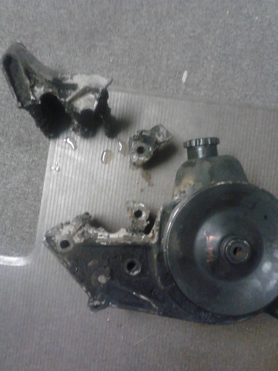 my engine has a special serpentine setup that makes some things really simple but others really complicated. my power steering pump died so I decided to swap to a Saginaw pump. problem is that the bracket prevents my alternator from mounting. my reverse flow waterpump prevents me from mounting it anywhere else

I cut off the A/C mount and notched the other area to mount my alternator there. it seems to work fine other than needing a new belt that's quite abit longer some reason.

II used my arc welder and cranked up the power to cut it. I was out of sawzall bladed and cutoff wheels. the welder did it no problem