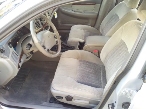 2001 Chevrolet Impala - Interior view of a 2001 Chevrolet Impala, highlighting the front seating area and dashboard.