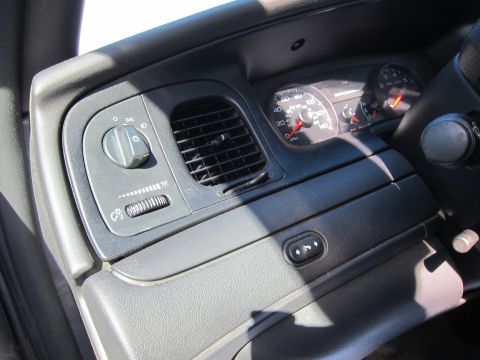 2001 Ford Crown Victoria - Dashboard view of a 2001 Ford Crown Victoria, headlight controls and instrument cluster.