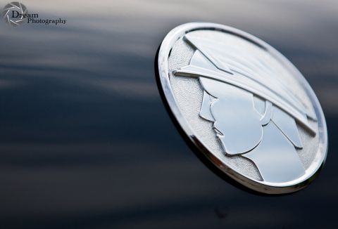 2003 Mercury Marauder - Mercury emblem detail on a 2003 Marauder. Supermotors.net website is also visible.