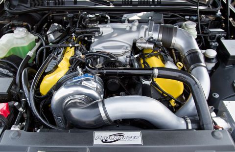 2003 Mercury Marauder - Close-up view of a modified engine bay a ProCharger supercharger system.