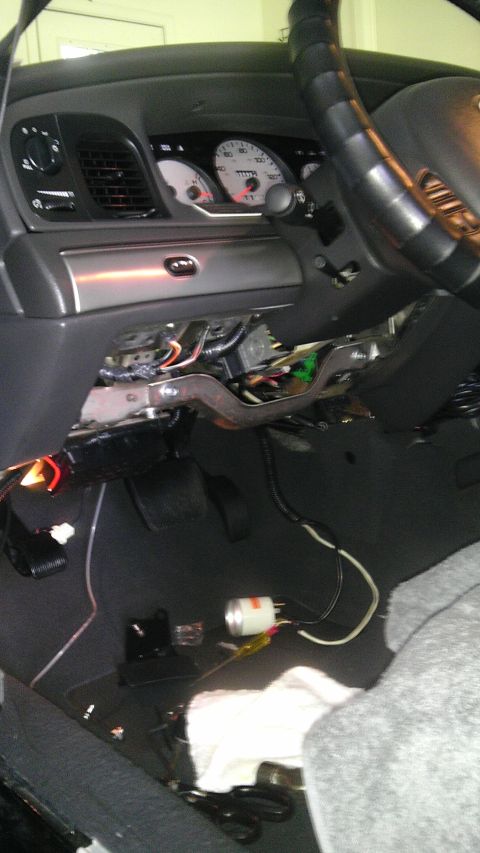 2003 Mercury Marauder - The interior of a 2003 Mercury Marauder shows exposed wiring beneath the dashboard, suggesting recent work or modifications.